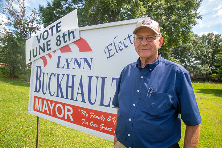 6.1 Ellisville Candidates Mayor Lynn Buckhaults stands next to a campaign sign in EllisvilleSertoma (photo by Cam Bonelli) .jpg